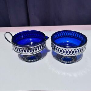 Vintage cobalt blue glass and chrome sugar and creamer set. Made in England